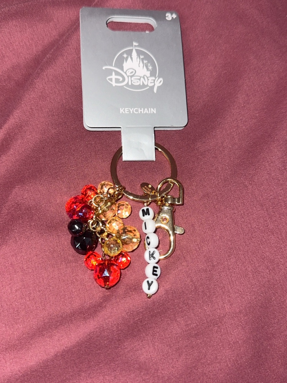 Disney Gold Mickey Bead Keychain with Red, Orange & Black Accents